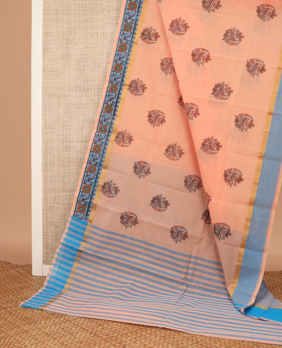 Orange musical instruments printed Chirala cotton saree, contrast floral creeper printed border, and striped pallu