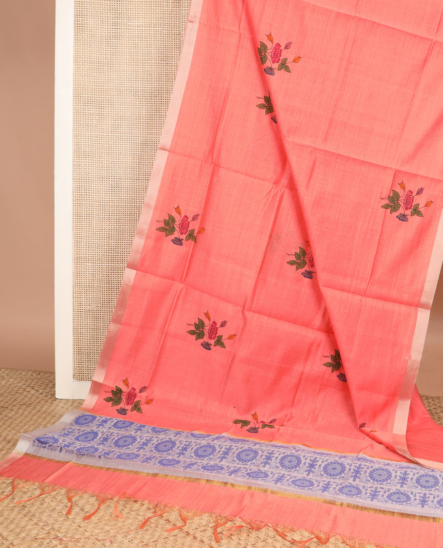 Peach floral buttas printed chirala cotton saree, bavanji border, and contrast chakram motifs pallu