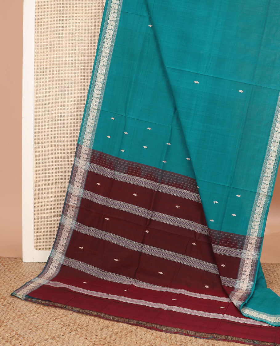 Blue buttas Andhra cotton saree, peacock motifs border, and contrast pallu of stripes and buttas