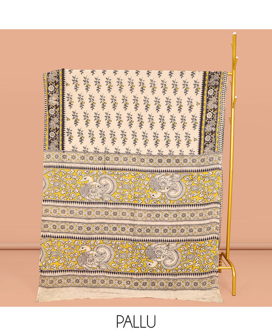 Cream Machine-Printed Kalamkari Cotton Saree, Decked Up with Floral Motifs on Its Body, Complemented by a Contrast Floral Printed Border, Pallu of Kalamakri Peacock Print, and Paired with a Printed Blouse