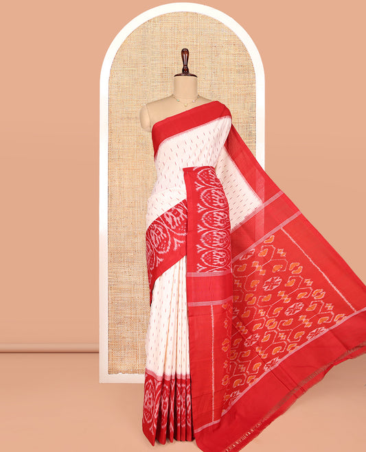 Cream Ikkat Cotton Saree, Features Ikkat Buttas All Over Its Body, Complemented by a Contrast Ikkat-Style Round Elephant Border, Intricately Designed Pallu, and Has No Blouse