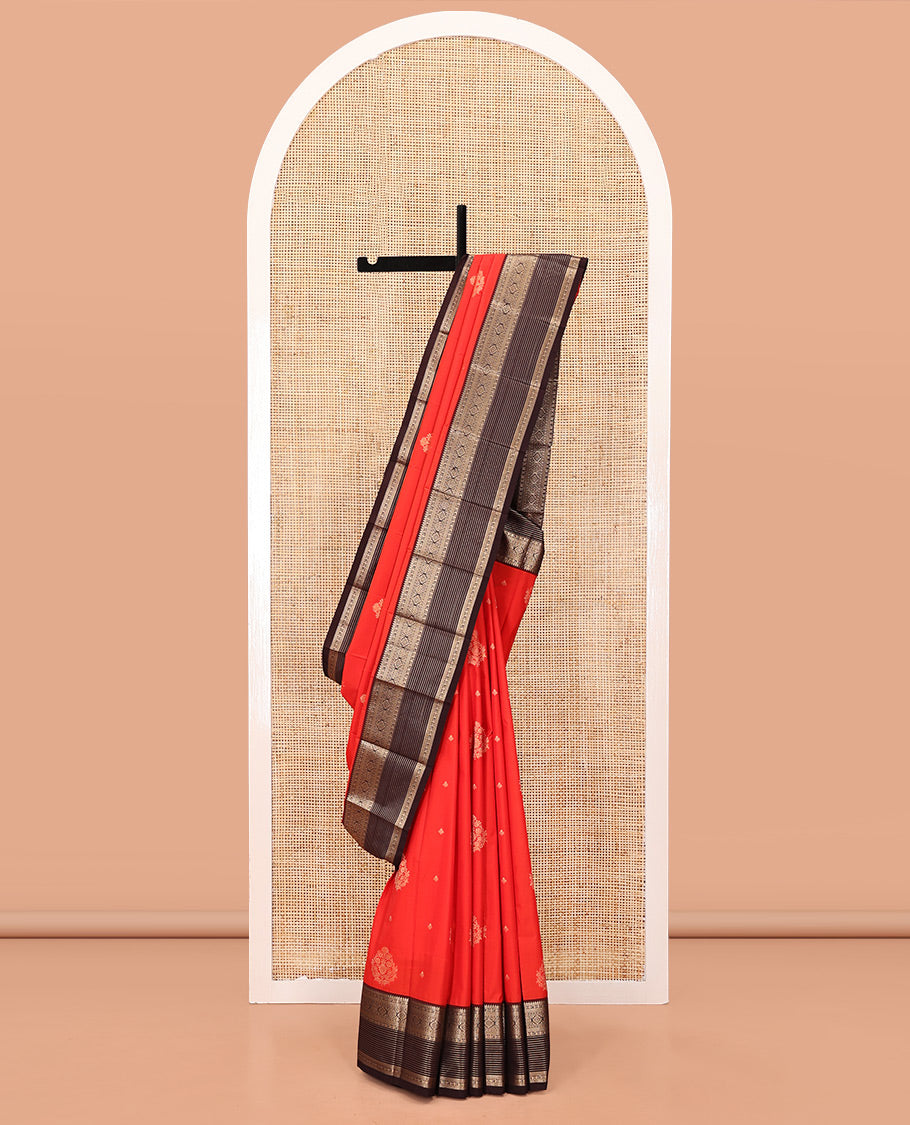 Red And Coffee Brown Budget Silk Saree, Adorned with Floral Zari Buttas All Over Its Body, Complemented by Contrast Traditional Zari Designs Woven Border, Grand Pallu and Paired with a Contrast Blouse
