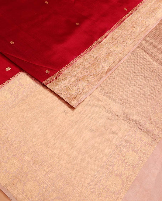 Red Raw Mango Silk Saree Decorated with Buttas, Featuring a Contrast Floral Creeper Zari-Designed Border, a Pallu Adorned with Chevron Zari Designs, Paired with a Contrast Blouse