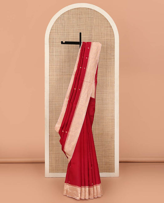 Red Raw Mango Silk Saree Decorated with Buttas, Featuring a Contrast Floral Creeper Zari-Designed Border, a Pallu Adorned with Chevron Zari Designs, Paired with a Contrast Blouse