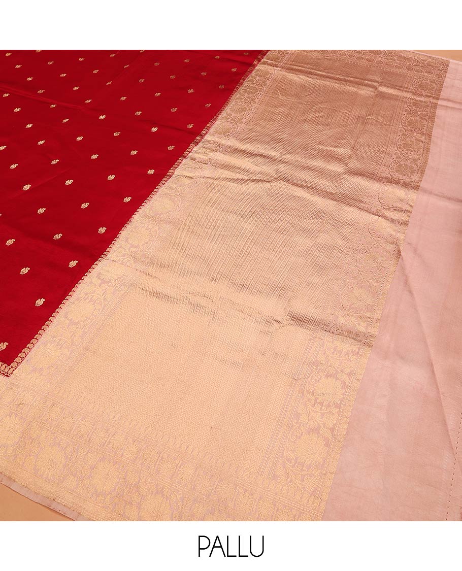 Red Raw Mango Silk Saree Decorated with Buttas, Featuring a Contrast Floral Creeper Zari-Designed Border, a Pallu Adorned with Chevron Zari Designs, Paired with a Contrast Blouse