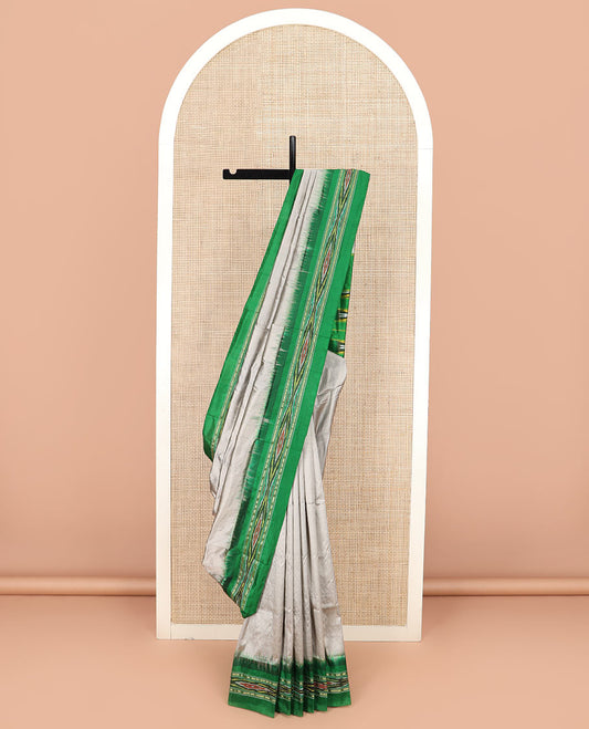 Grey Plain Ikkat Silk Saree with a Contrast Green Border Decked with a Hazy Ikkat Weave, Featuring a Pallu Flanked by Stripes and Ikkat Texture