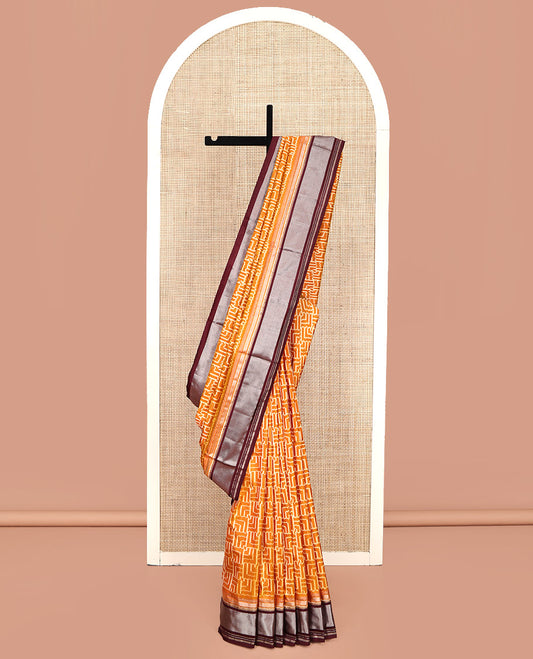 Yellow Pochampally Ikat Silk Saree, Decorated with Ikat Geometric Designs on Its Body, Complemented by a Contrast Zari Peacock-Eye Border, Ikkat Weave Pallu, and Paired with a Contrast Blouse