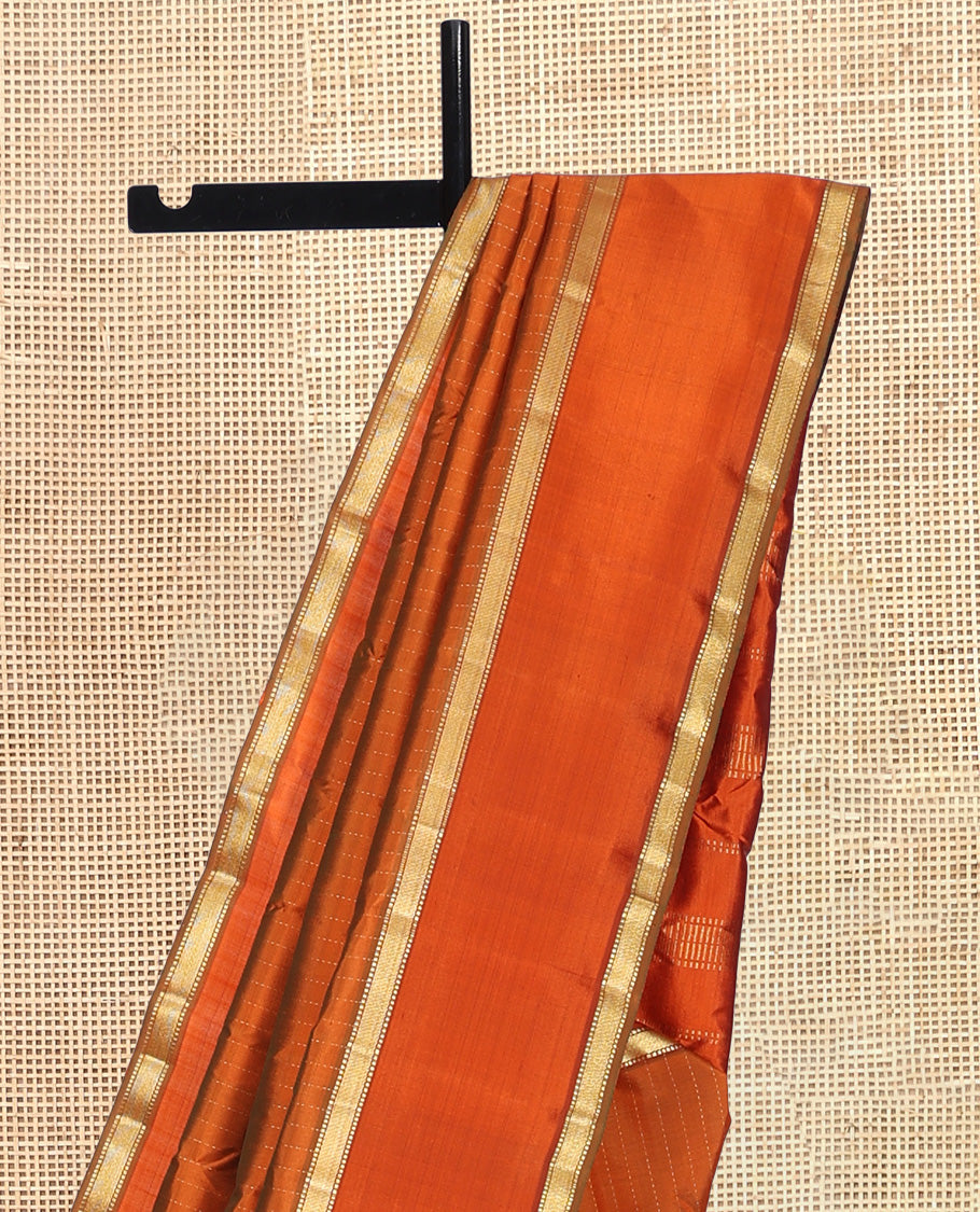 Orange Kanchipuram Silk Saree, Sparsely Woven with Muthu Zari Stripes, Highlighted by Rettai Pettu Traditional Border, Zari Striped Pallu, and a Matching Blouse