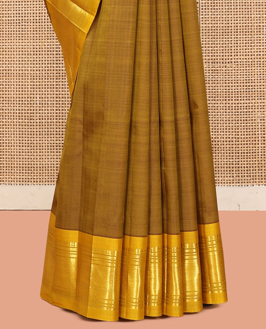 Green Kanchipuram Silk Saree, Elevated with Zari Buttas, a Contrast One-Sided Border of Paneer Sombu, Banaras, Muthu, and Jaal Designs, a Zari Design Pallu, and No Blouse