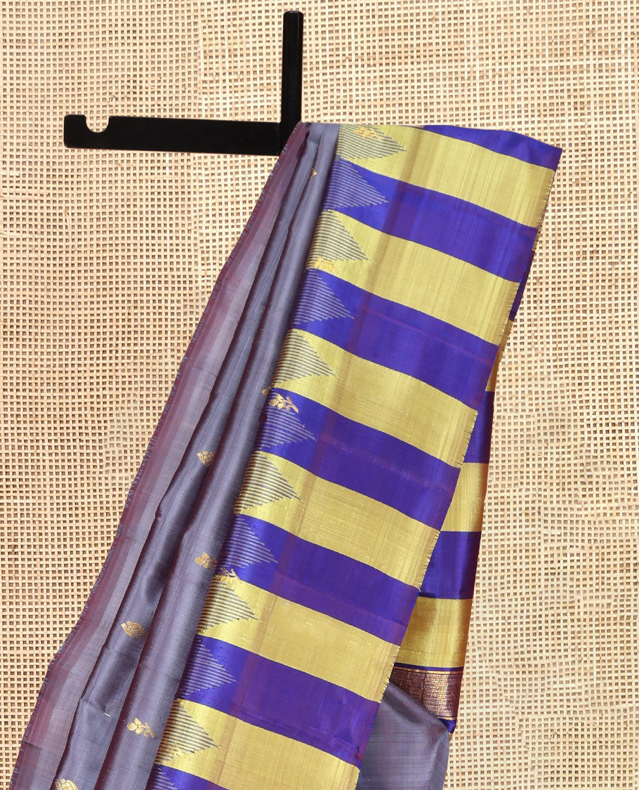 Grey Kanchipuram Silk Saree, Elevated with Zari Buttas, Complemented by a Contrast One-Sided Thazampoo Rekku Border, Zari Woven Pallu, and a No Blouse