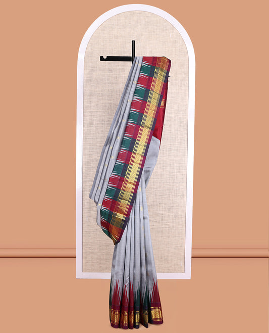 Grey Kanchipuram Silk Saree, Elevated with Zari Buttas, a Contrast One-Sided Border of Thazhampoo Rekku, Paneer Sombu, Banaras and Mayil Kann Design, Zari Design Pallu, and No Blouse
