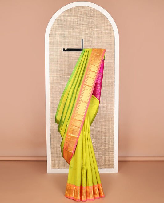 Light green buttas kancheepuram silk saree with contrast border of thilakam moku, banaras, kuyil kann design & zari design pallu