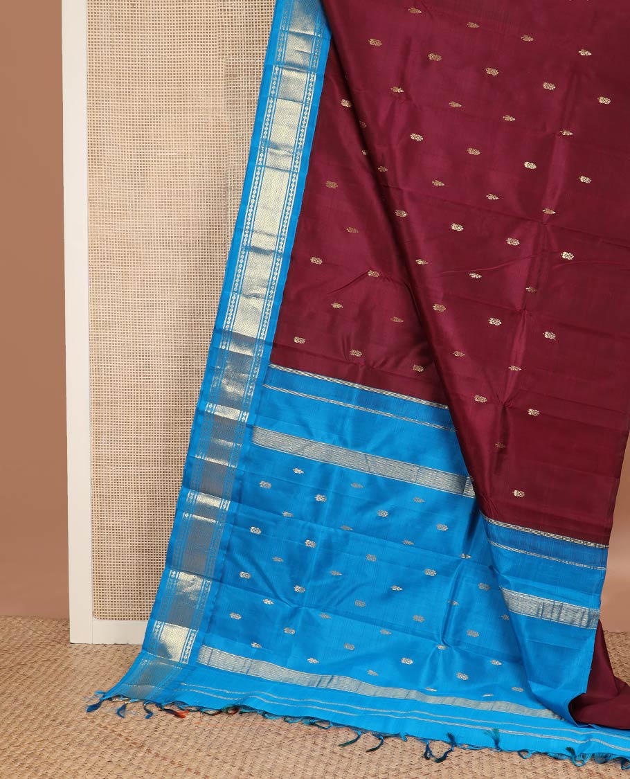 Maroon zari buttas kanchipuram silk saree, contrast one-sided korvai border of lavangam & mayil kann designs & zari design pallu