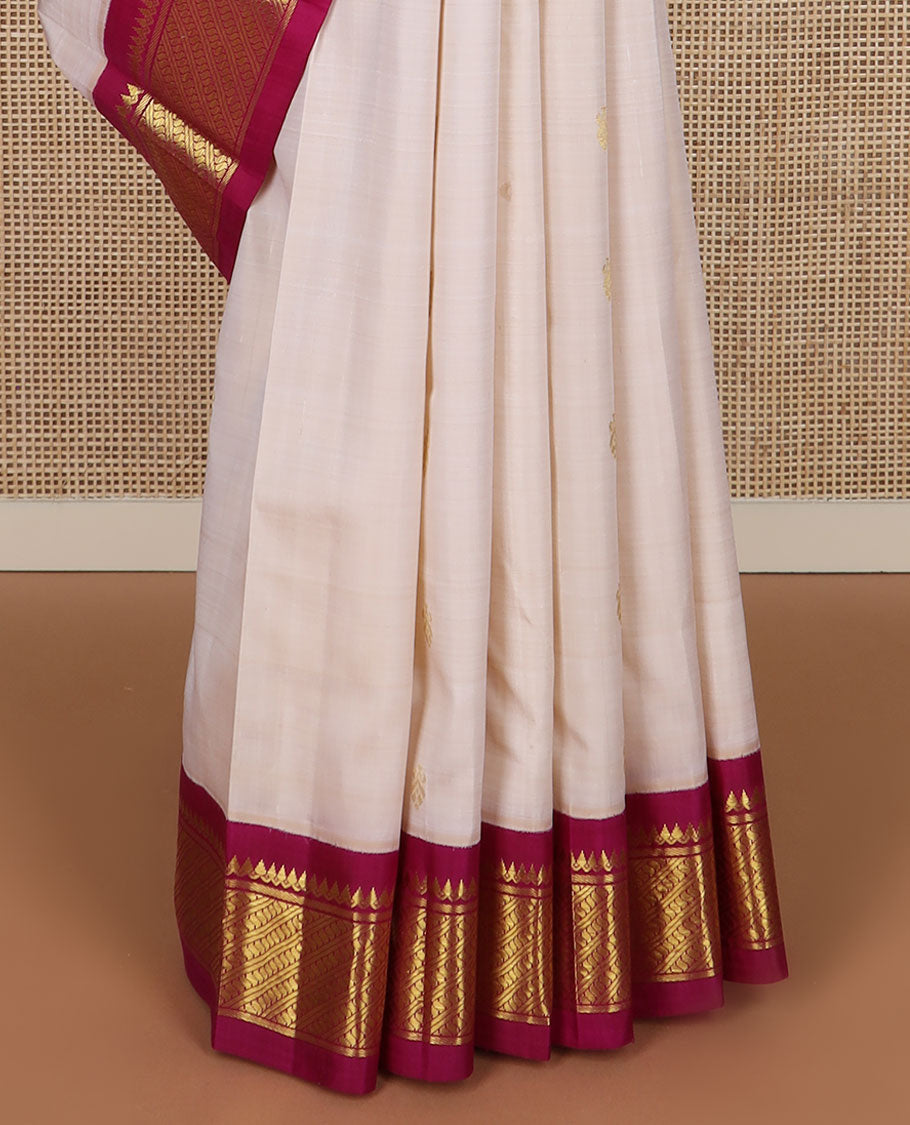 Cream zari buttas Kanchipuram silk saree, contrast korvai border of thilakam mokku & puli nagam design & zari design pallu