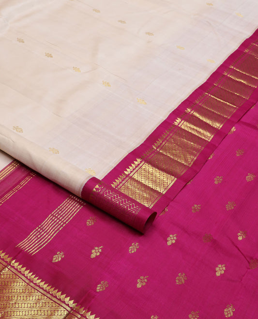 Cream zari buttas Kanchipuram silk saree, contrast korvai border of thilakam mokku & puli nagam design & zari design pallu