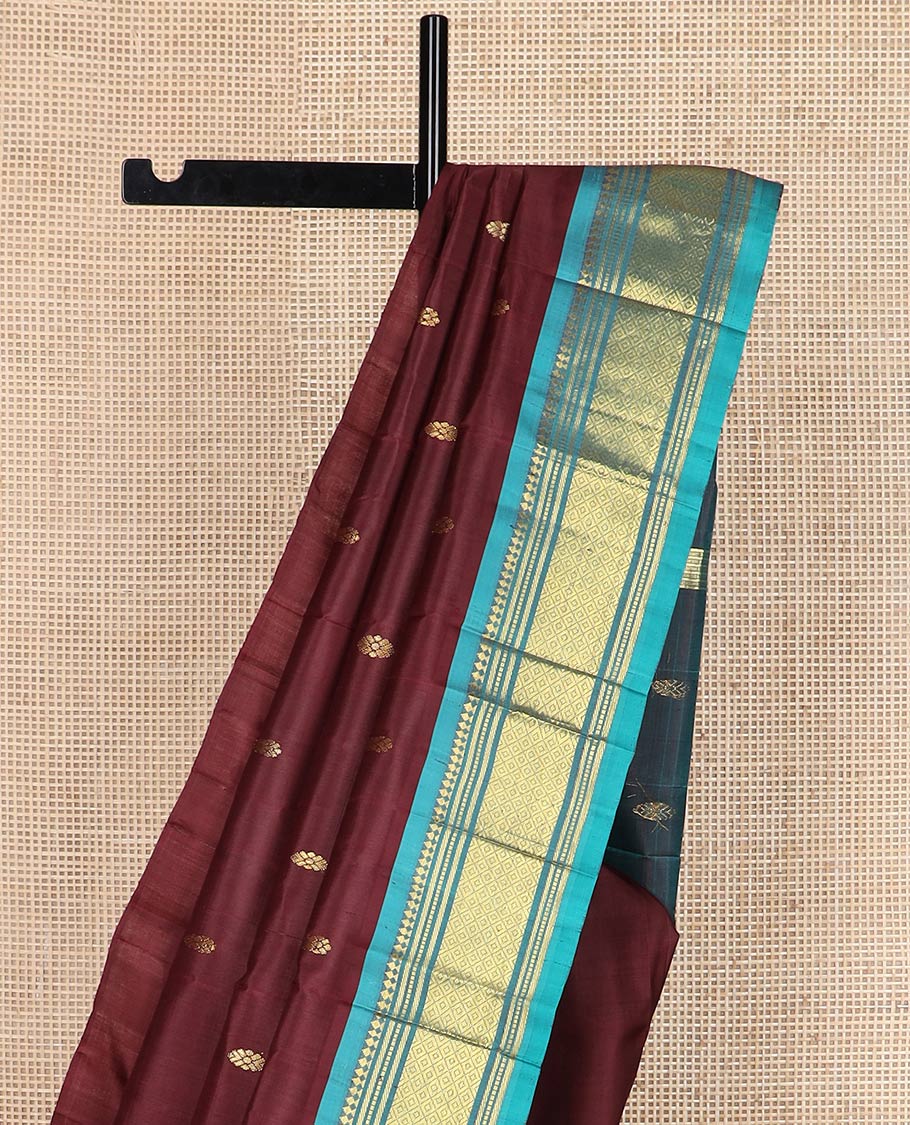 Maroon zari buttas silk saree, contrast one-sided border of panner sombu,banaras,muthu & mayil kann designs & zari design pallu
