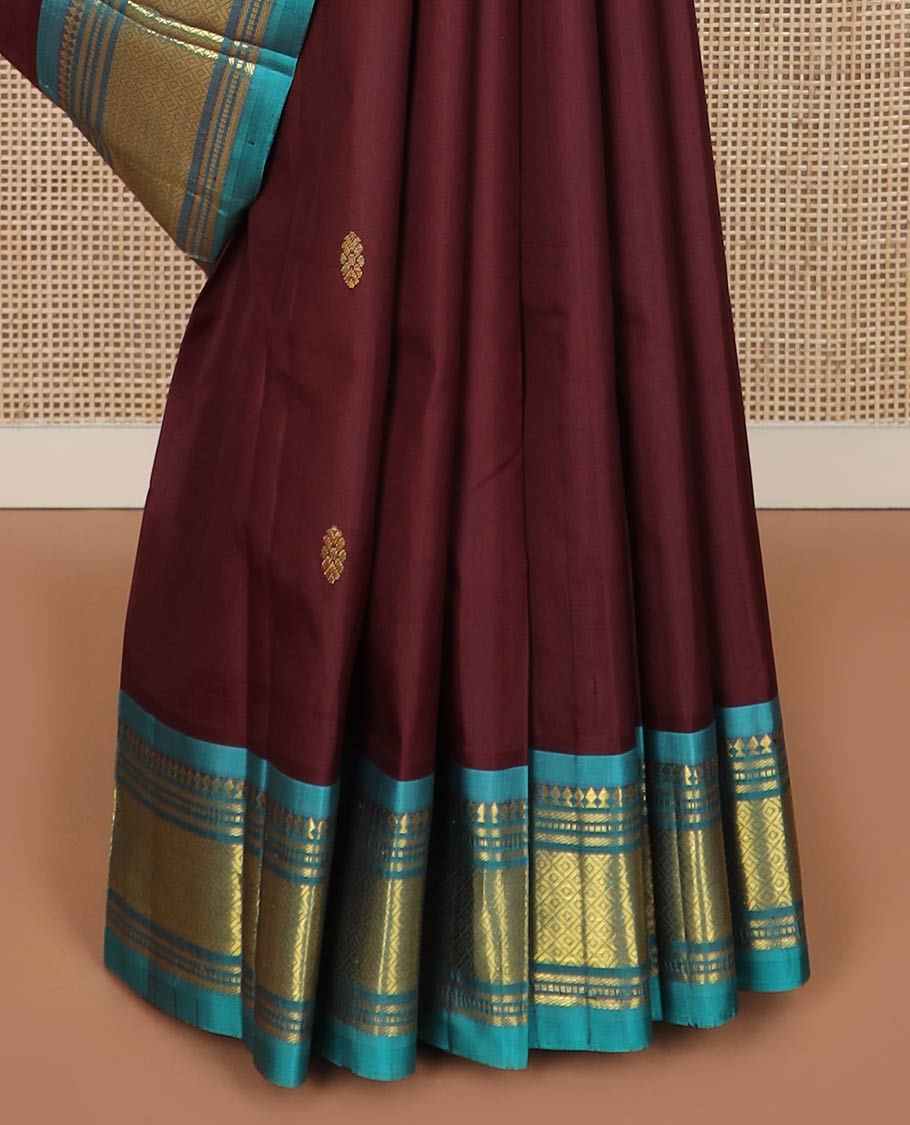 Maroon zari buttas silk saree, contrast one-sided border of panner sombu,banaras,muthu & mayil kann designs & zari design pallu