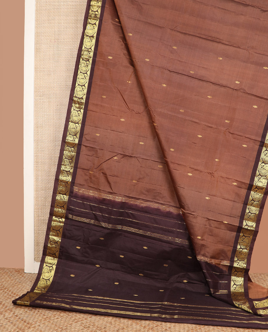 Brown zari buttas Kanchipuram silk saree, contrast mayil enclosed manga zari border, and zari design pallu