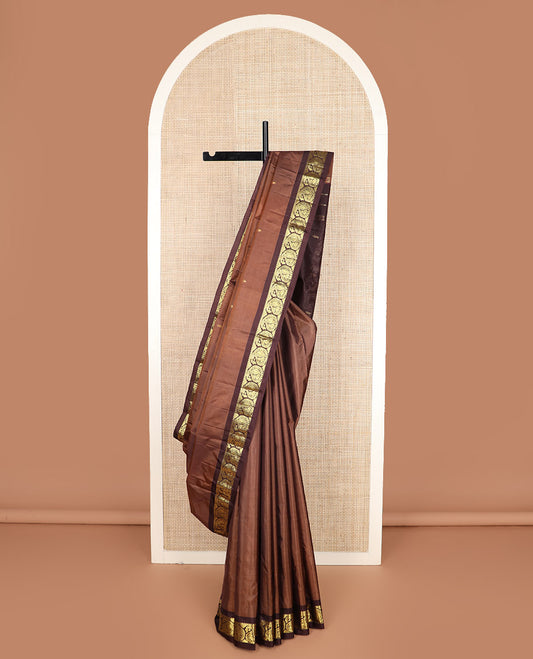 Brown zari buttas Kanchipuram silk saree, contrast mayil enclosed manga zari border, and zari design pallu