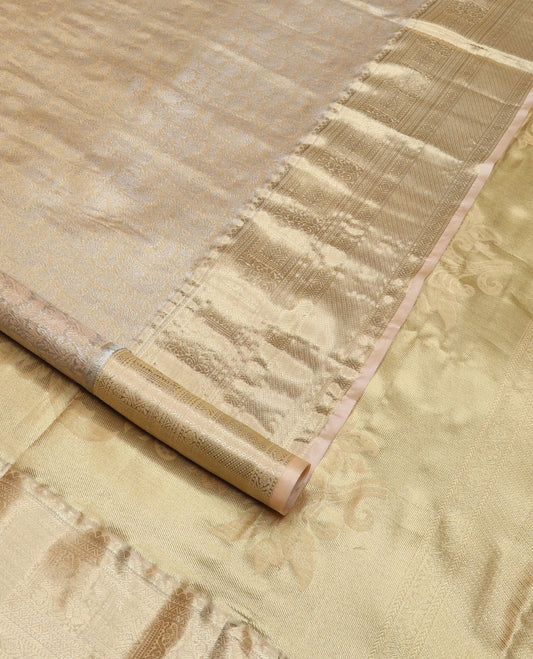 Cream zari jacquard Kanchipuram tissue silk saree, traditional zari border and pallu of floral designs