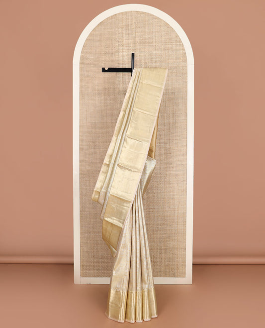 Cream zari jacquard Kanchipuram tissue silk saree, traditional zari border and pallu of floral designs