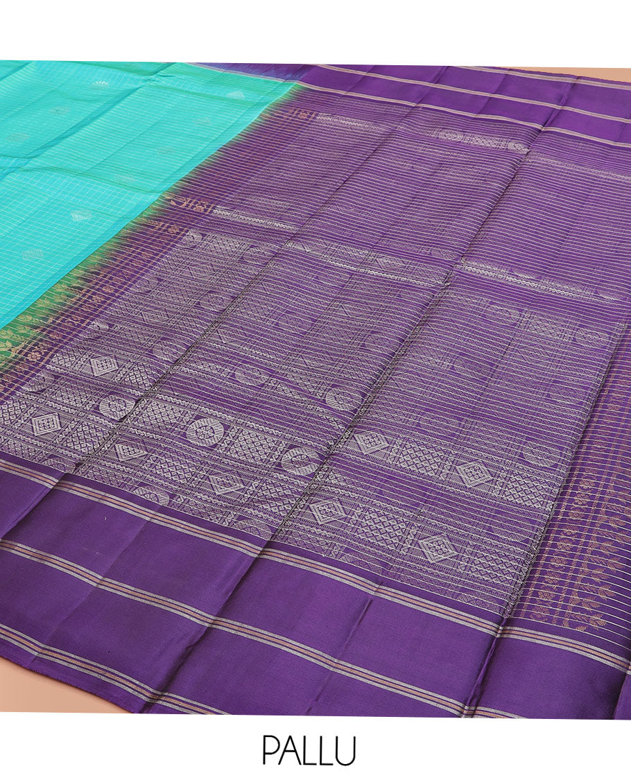 Blue Kanchipuram Silk Saree Elevated with Buttas and Checks All Over Its Body, Complemented by a Contrast Border of Stripes, Featuring Pallu of Intricate Designs, and Paired with a Contrast Blouse