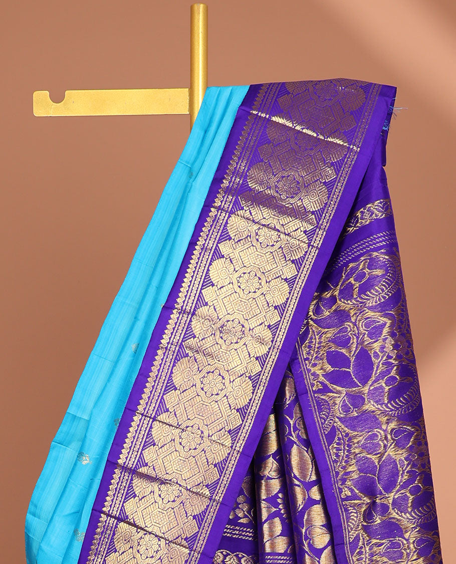 Blue floral buttas kancheepuram silk saree with contrast intricate zari border & floral zari design pallu