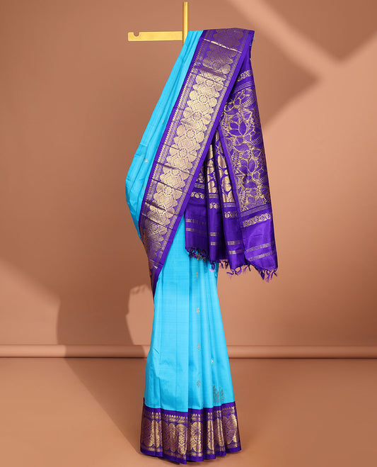 Blue floral buttas kancheepuram silk saree with contrast intricate zari border & floral zari design pallu