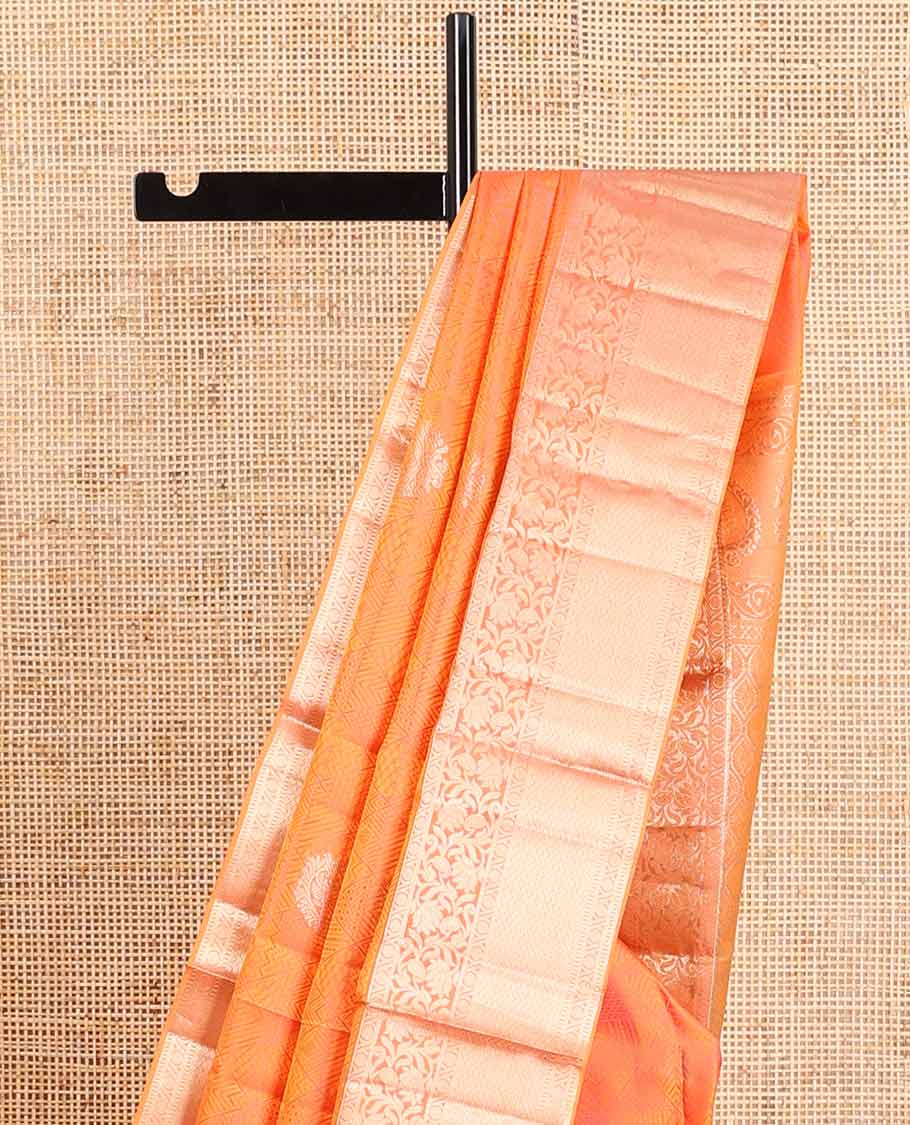 Orange geometric, floral design kancheepuram silk saree with contrast border of poo chakarm, muthu, kodi visiry design & zari design pallu