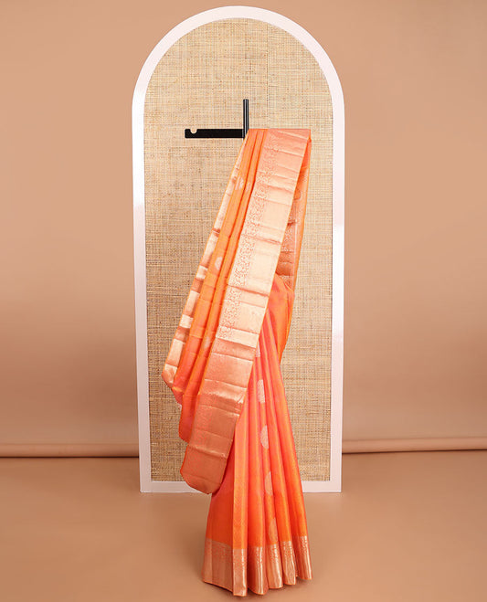 Orange geometric, floral design kancheepuram silk saree with contrast border of poo chakarm, muthu, kodi visiry design & zari design pallu