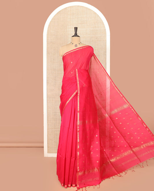 Red Maheshwari Cotton Saree Embellished with Zari Buttas, Highlighted with a Traditional Zari Piping Border, Pallu Decked Up with Zari Stripes and Floral Buttas, and Paired with a Matching Blouse