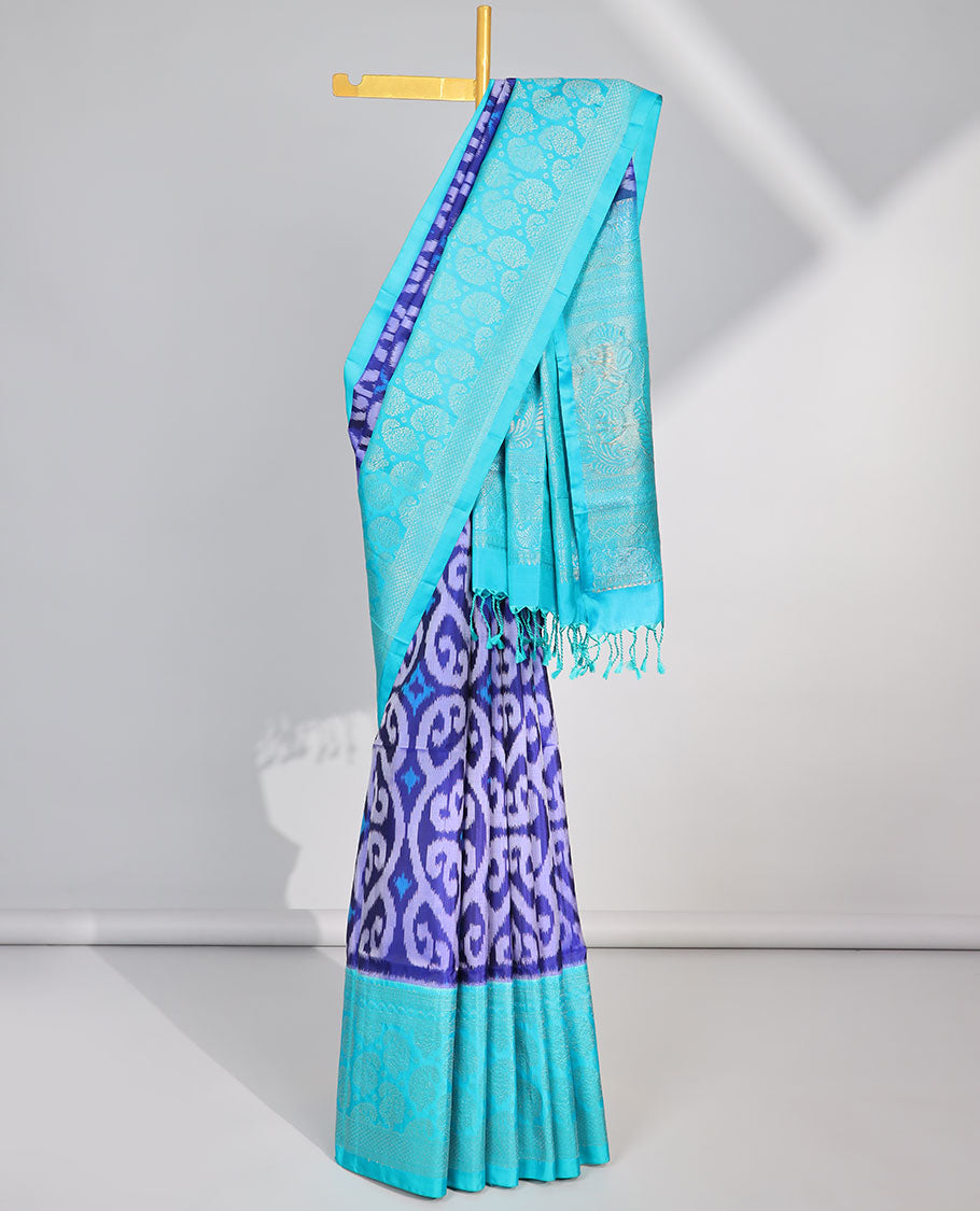 Blue ikkat style floral vine design soft silk saree with contrast zari border & intricate zari design pallu