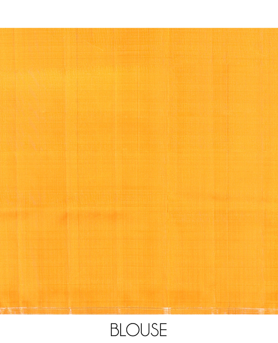 Orange Mayuri Soft Silk Saree, Elegantly Woven with Floral Zari Buttas on Its Body, Subtle Piping Border, Majestically Detailed Pallu, and Paired with a Matching Blouse
