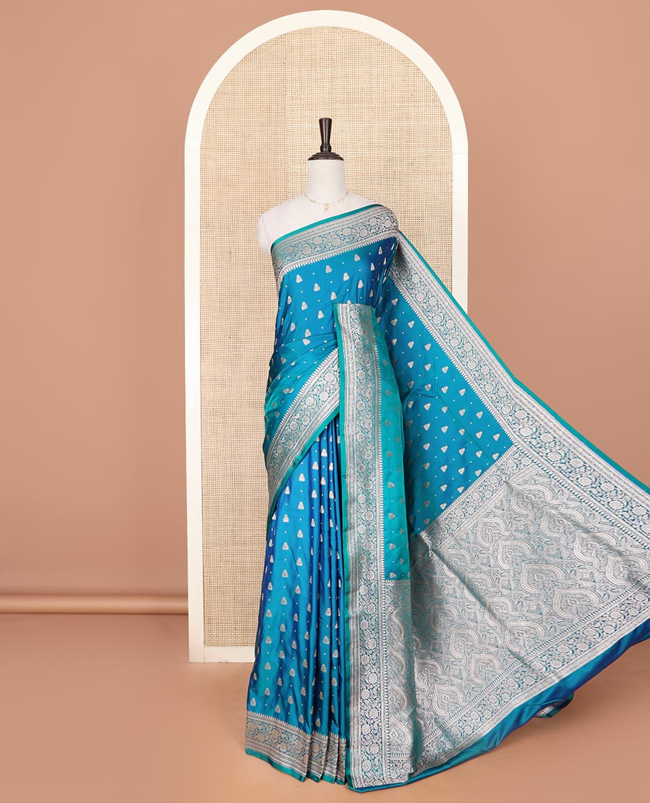 Blue zari buttas mushru silk saree, floral creeper design border, and intricately designed pallu