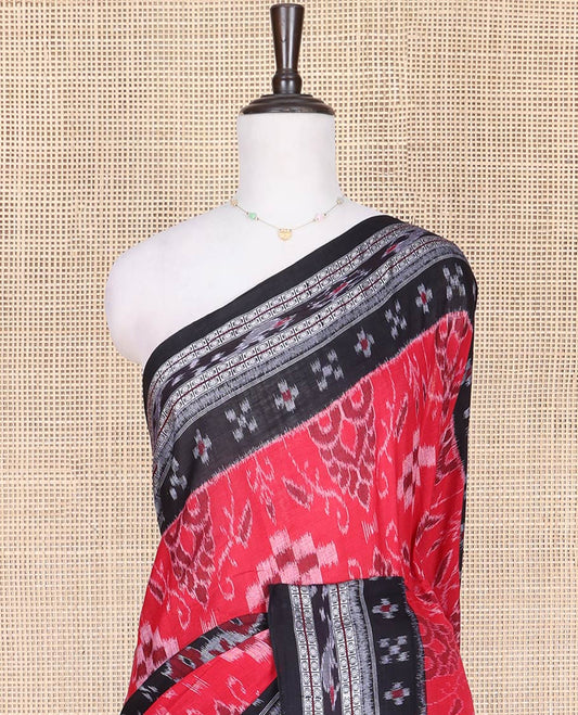 Red Odisha Cotton Saree, Delicately Woven with Intricate Designs All Over the Body, Complemented by Contrast Border of Floral Designs in Hazily, Contrast Pallu of Unique Designs in Hazily, and Paired with a Matching Blouse