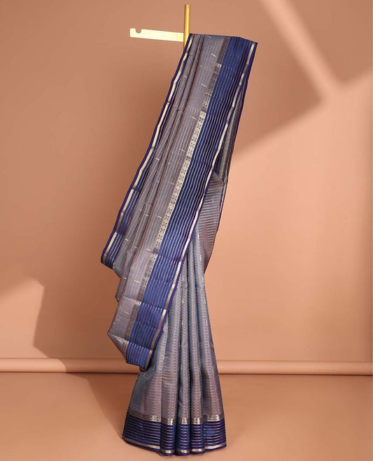 Grey checked vasundhara elite silk saree with contrast striped zari design border & intricate zari design pallu