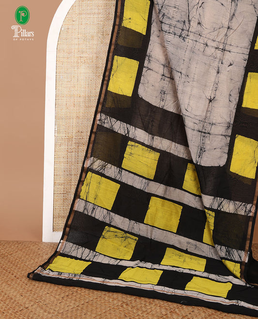 Grey hand block batik printed chanderi cotton saree with black wax, checked border & black wax printed pallu along with plain blouse