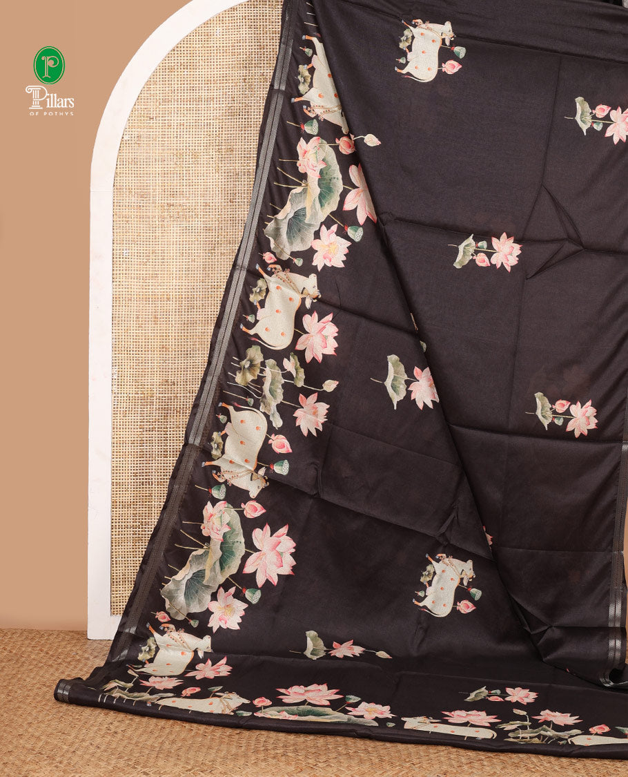 Black pichwai print muslin cotton saree with zari piping border & pichwai printed pallu along with lotus flower printed blouse