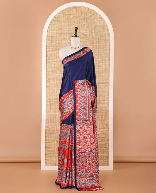 Blue half-plain & half-printed gajji silk saree, contrast red border & pallu of ajrakh-print with printed blouse