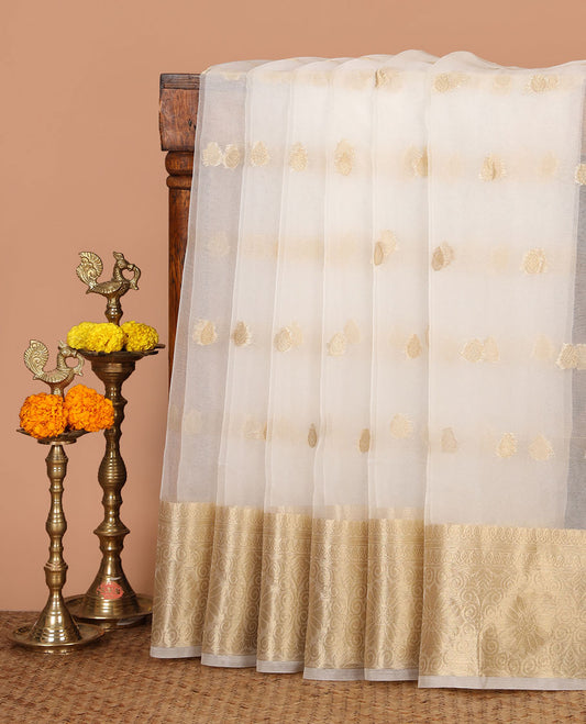 White semi-organza saree with zari buttas, zari border of temple & floral creeper designs, zari design pallu & running blouse