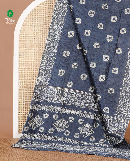 Grey batik-floral buttas printed litchi crushed saree, batik-floral printed border, printed pallu & butta print blouse