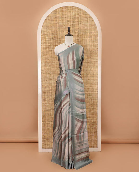 Blue ombre-color abstract-printed satin crepe saree, copper zari line weave border & matching jaal printed blouse