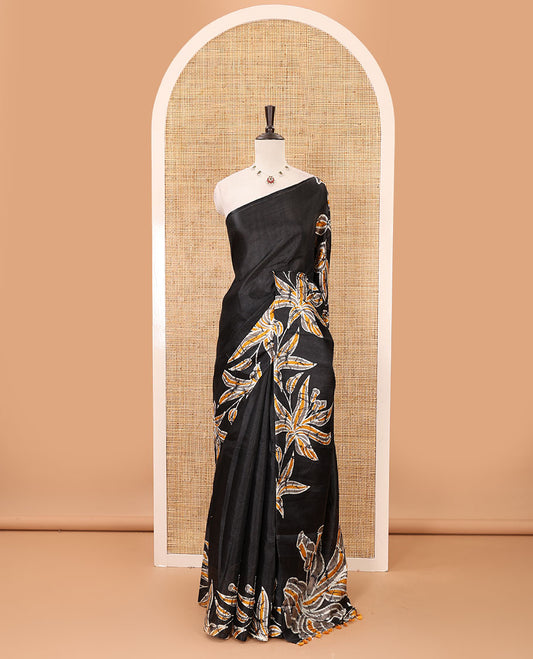 Black-base plain body khadi cotton saree with batik-style orange-color floral printed border & pallu, line-type blouse