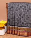 Black pochampally design semi- patola saree with traditional border