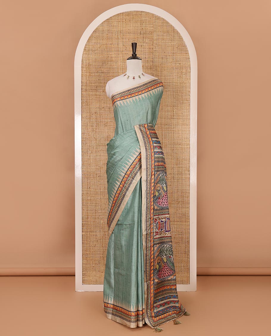 Green plain semi-tussar saree, contrast temple geometric printed border, kaleidoscope-colored Madhubani-style printed pallu & contrast plain blouse