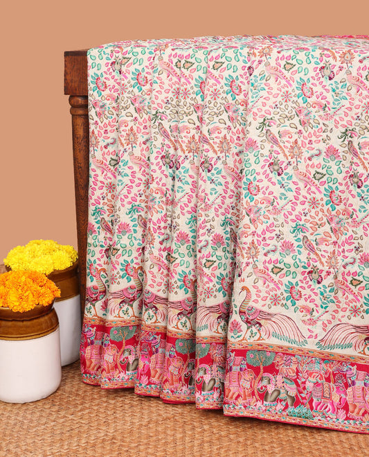 Cream with rani pink  all-over postion print dola silk saree contrast elephant print border & postion printed rich pallu along with contrast brocade blouse