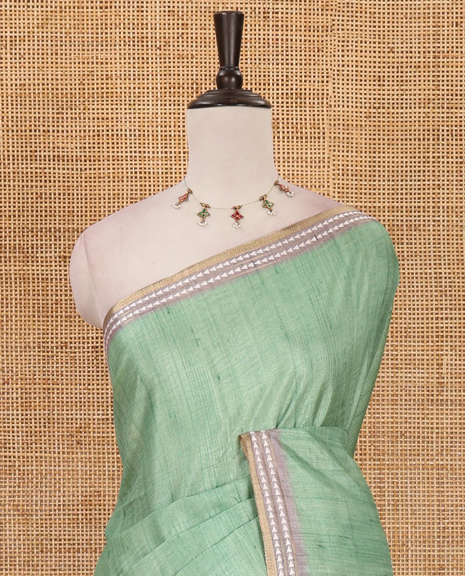 Parrot green full-plain design semi-tussar saree, contrast thread triangle motifs border, bird motifs printed pallu & contrast striped blouse