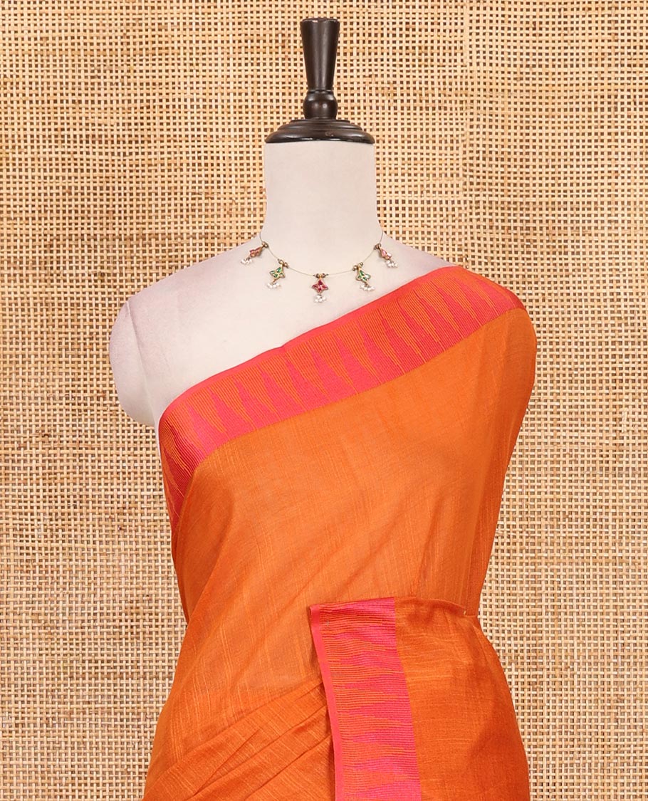 Orange plain staple cotton saree, contrast temple border, striped pallu & vertical striped blouse