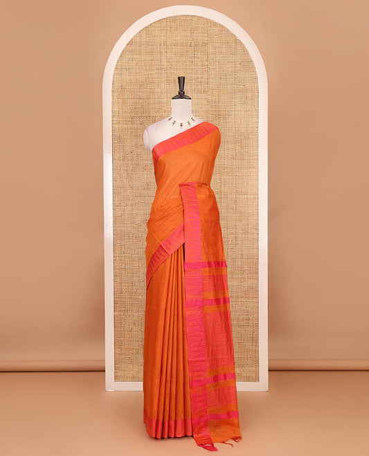 Orange plain staple cotton saree, contrast temple border, striped pallu & vertical striped blouse