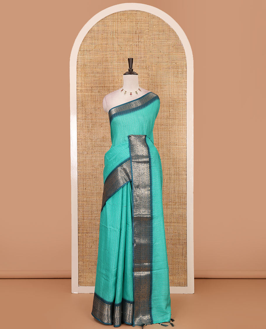 Rama green gold zari vertical striped dola silk saree, contrast traditional zari border of manga design, striped pallu & contrast diamond design blouse